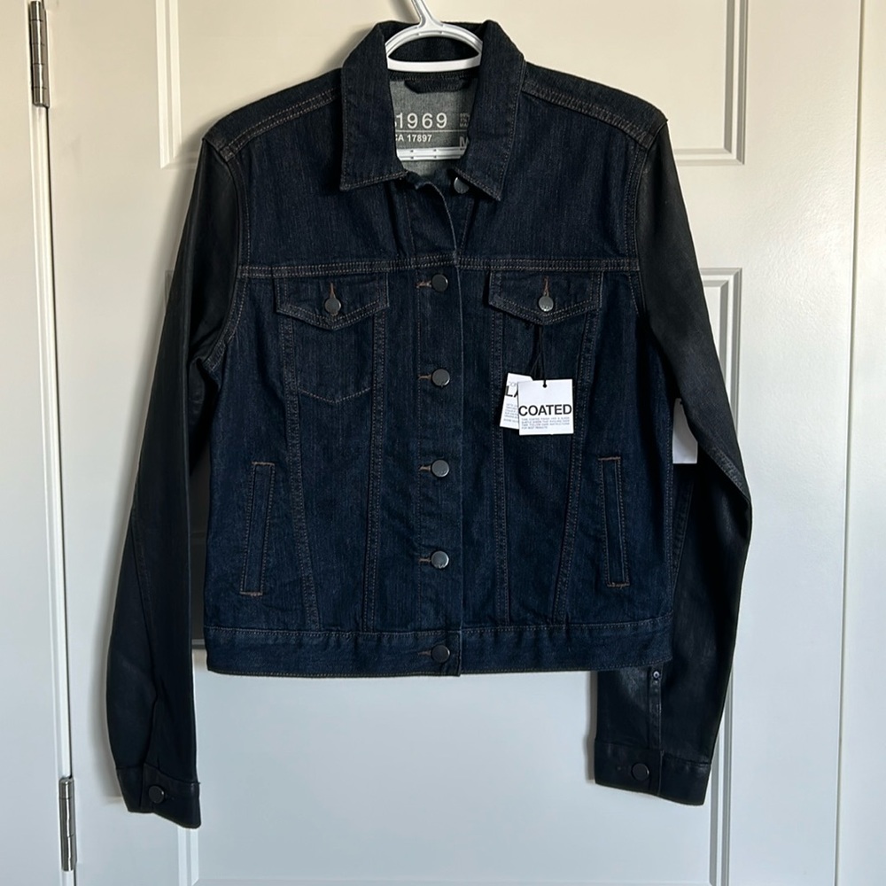 Gap denim jacket with coated sleeves.